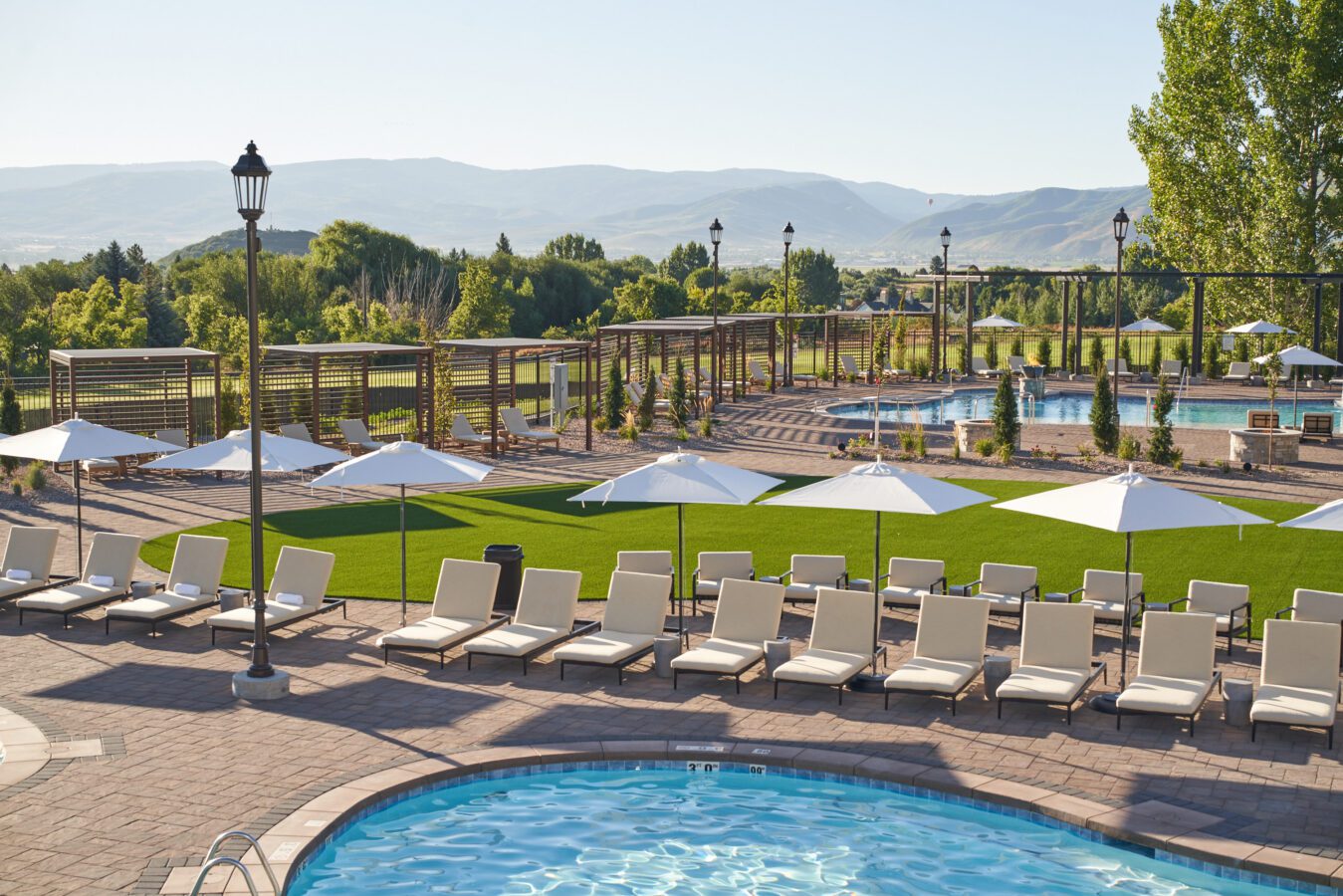Outdoor pool with lounge chairs