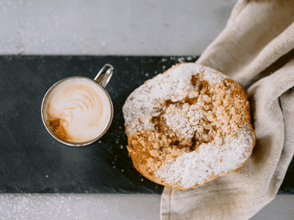 Cup of coffee and pastry