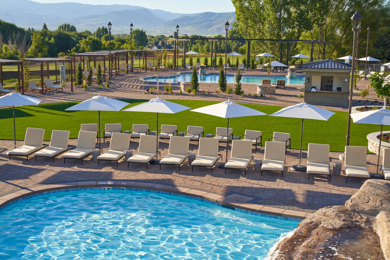 Outdoor pool with lounge chairs