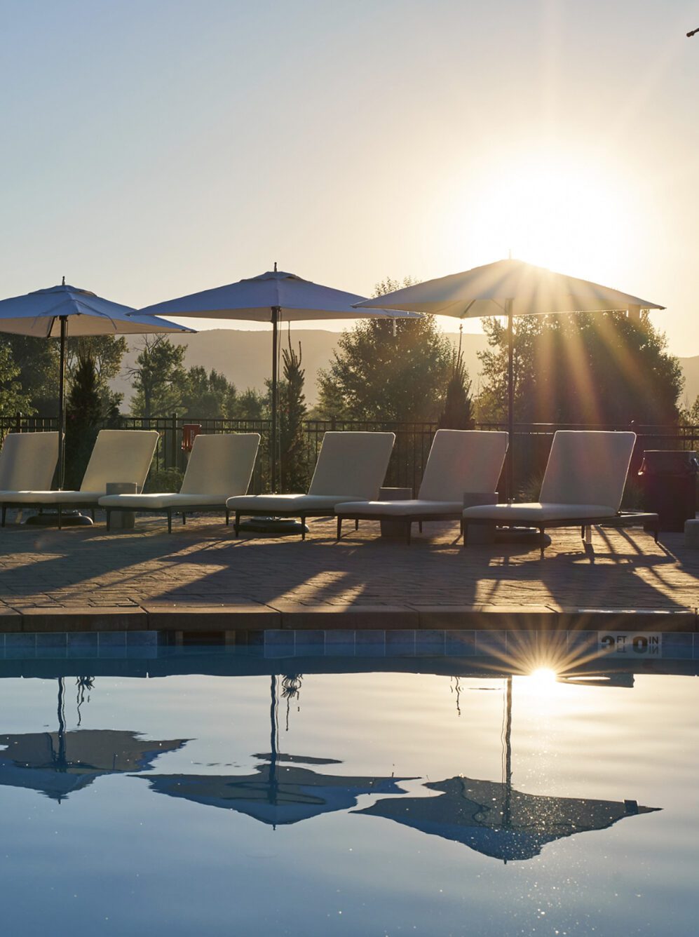 Lounge chairs near the outdoor pool