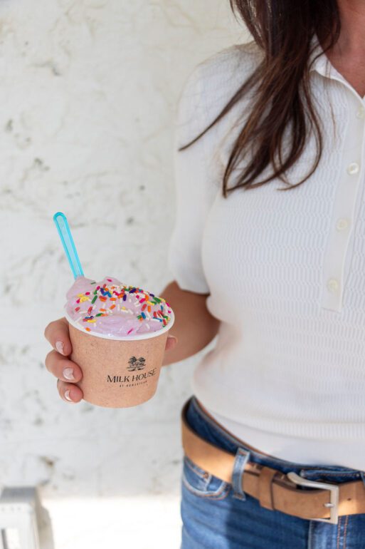 Woman holding a cup of ice cream
