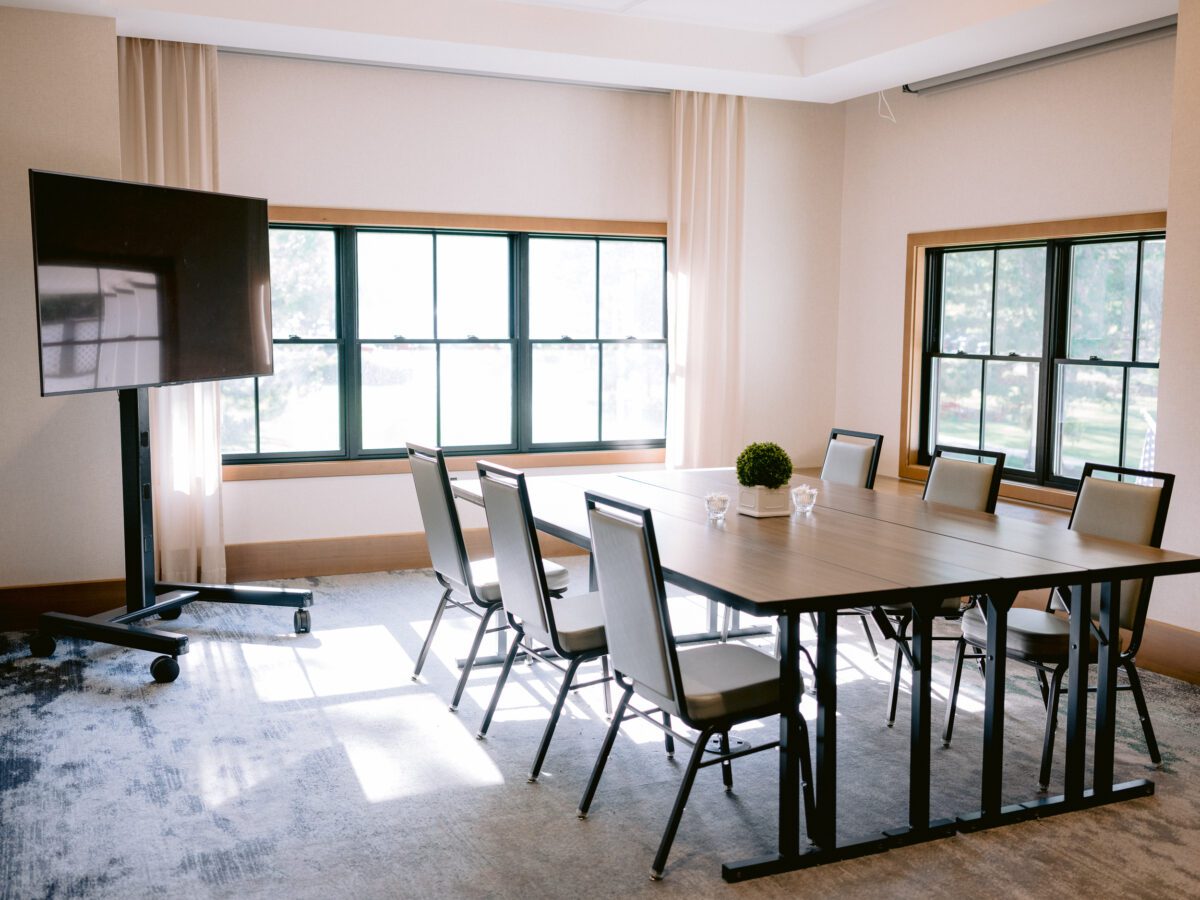 Meeting room with the desk, chairs and screen