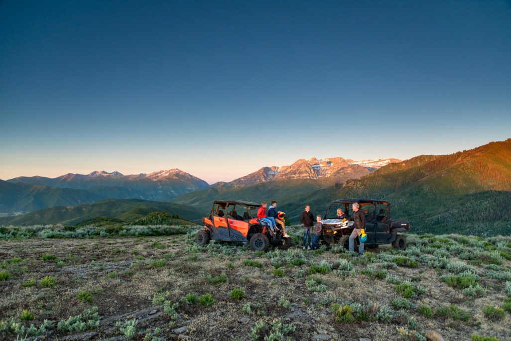 Utah landscape and two ATV cars and people